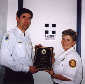 John Staunton and Kari Phair accepted the 'Volunteer EMS Agency of the Year' award